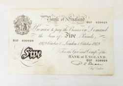 Two Bank of England £5 notes (1 October 1949, signed by P S Beale, vf nibbles to edge,