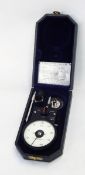 Smiths speed gauge in green leather covered carrying case,