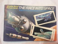 A collection of cigarette cards to include tropical birds, butterflies, animals, flowers,