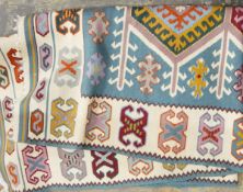 Tunisian cotton kelim with lozenge decoration, in shades of pink, grey, black and cream,