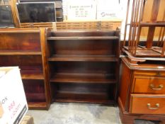 Two three-tier open bookcases