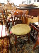 Tub-shaped elbow chair with green velvet seat,