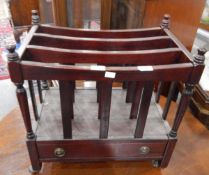 A mahogany three-division canterbury fitted a drawer to base