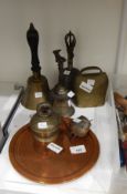 Brass handbell with turned wooden handle, 26cm high, two Eastern metal handbells, two cow bells,