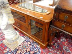 Modern television stand and a 1970's shaped mirror (2)