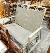 Modern aluminium-framed rocking outdoor garden seat