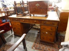 Victorian oak partner's pedestal desk with an arrangement of nine short drawers to each side,