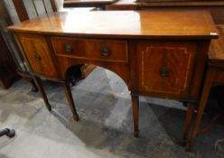 Georgian style mahogany cross-banded bow-front sideboard on six square tapering supports with spade