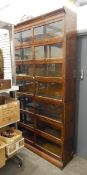 Oak seven-tier Globe Wernicke-style sesctional bookcase