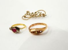 Synthetic ruby and diamond three-stone crossover ring marked 18ct,