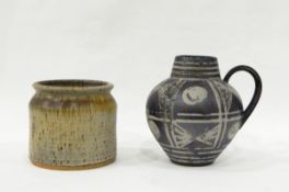 Austrian pottery ewer of bulbous form, decorated with geometric design in grey glazes,