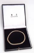 18ct gold and diamond collar necklace, having three interlinked rows of almond-shaped links,