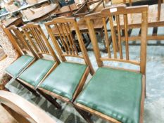 A set of four Edwardian railback dining chairs with satinwood inlay,