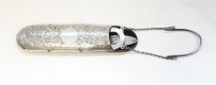 Victorian silver spectacles case with foliate scrollwork engraving,