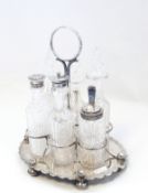 A Victorian silver cruet stand and bottles, Sheffield 1878,
