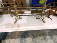 Brass fire curb with fire dogs,