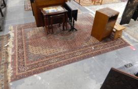 An Eastern style rug, central lozenge to centre field,