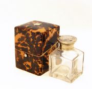 Victorian glass scent bottle with white metal top,