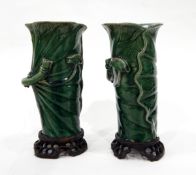 Japanese vase of squat bulbous form decorated with prunus blossom, on a black ground,