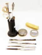 Small collection of hatpins with stand, three old penknives, money clip, etc.