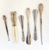 Pair of silver-handled glove stretchers,