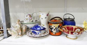 Noritake two-handled pedestal bowl decorated with panels of flowers on a gold and red ground,