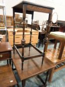 Oak side table on narrow turned supports,