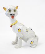 Mosanic cat in seated position with hearts, circles and other shapes,