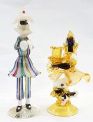 Three latticinio glass figures playing cymbals, banjo,