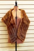 Mink stole with brown satin lining
