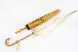 Cotton broderie anglaise parasol with faux-bamboo handle and a silk tassel,