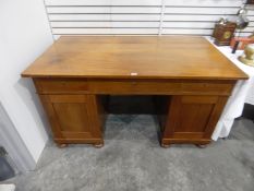 Mahogany pedestal writing desk with three frieze drawers, cupboard below, on pad feet,