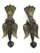 Bronze-effect metal Chinese teapot with raised relief moulded figural decoration and a pair of