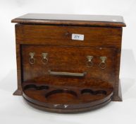 Early 20th century oak smoker's compendium set,