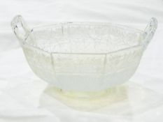 Sowerby octagonal vaseline pressed glass two-handled bowl, the panels decorated with flowers, 16.