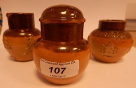 Three Doulton Lambeth stoneware items including a mustard pot with moulded decoration,