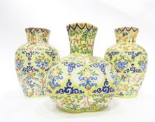 Suite of three Victorian glass vases comprising a pair of baluster form and a lobed vase,
