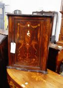 Edwardian rosewood corner cupboard with inlaid classical scene panel door, enclosing shelf,