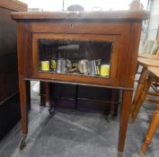 Early 20th century mahogany drinks cabinet, the top opening to reveal glass holders and glasses,