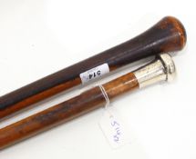 Malacca walking cane with silver finial bearing the crest for the Wiltshire Regiment and a lignum