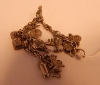 Jewelcraft charm bracelet, the charms depicting modes of transport, including hot air balloon,