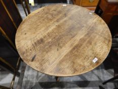 19th century oak circular-top tripod table on turned pedestal, with splayed legs,
