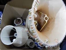 A pair of ceramic table lamps decorated with butterflies in the oriental style,