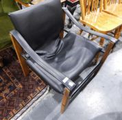 Contemporary leather low armchair with steel and wood frame