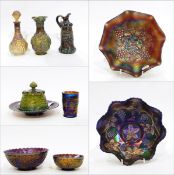 Amethyst carnival glass dish in the 'Grape and Cable' pattern, 23cm wide,