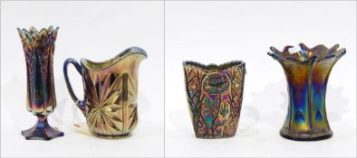 Blue carnival glass jug with star decoration, 19cm high,