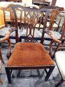 Chippendale-style mahogany elbow chair with pierced Gothic splat, upholstered drop-in seat,