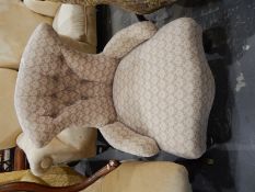 Victorian buttonback occasional armchair on turned legs with castors