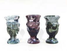 Pair of Victorian white and green marbled pressed glass vases modelled with chained swans and