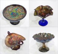 Carnival glass pedestal bowl decorated in the 'Butterfly Bush' pattern, 24cm diameter,